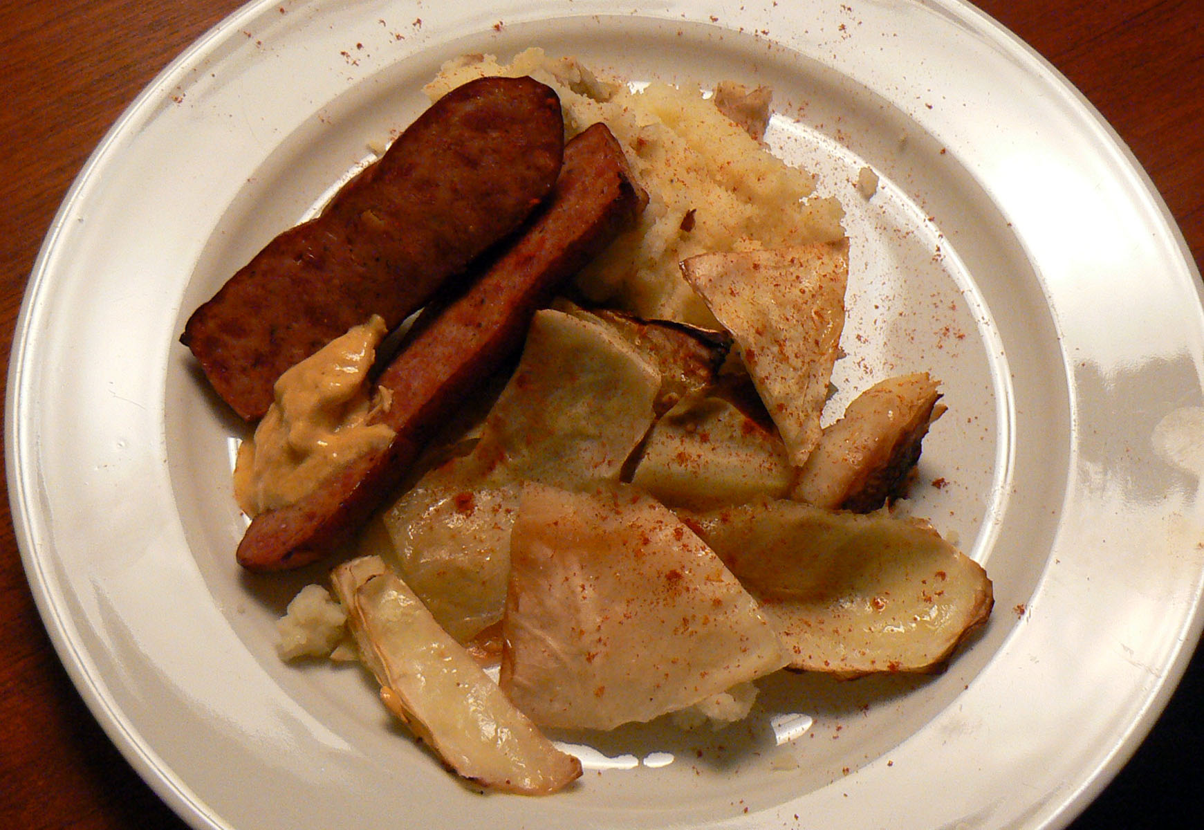 Roasted cabbage with grilled garlic sausage and garlic mash Hand Made